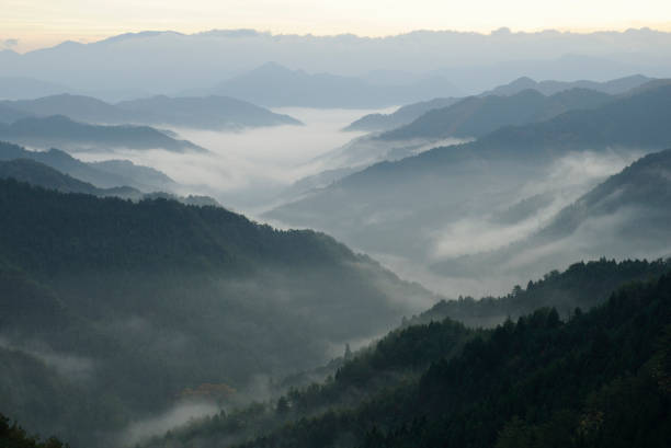 istock Dawn of mountains and clouds 665594090