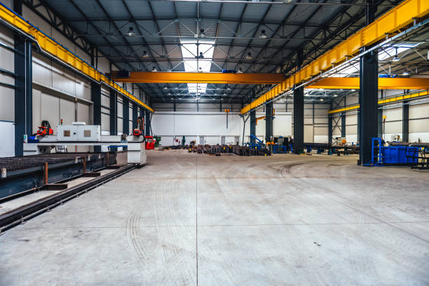 istock Industrial hall with machines and metal profiles 665603054