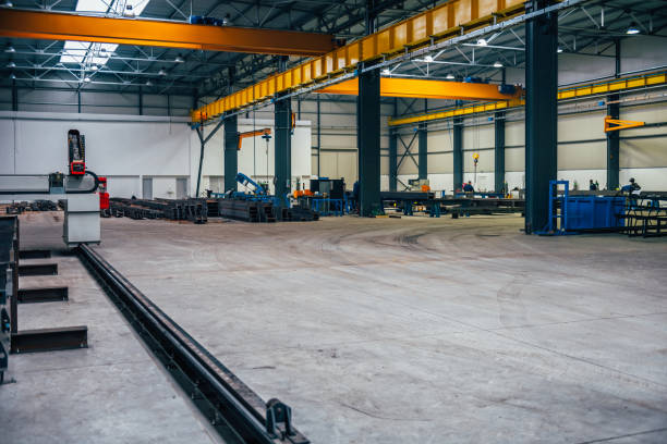 istock Industrial hall with machines and metal profiles 665603120
