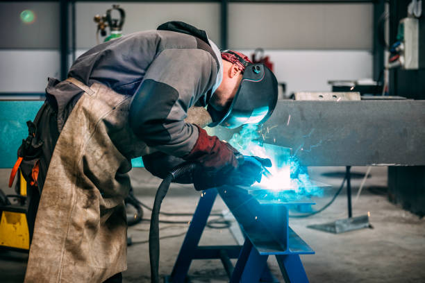 istock Industrial Welder With Torch 665603208