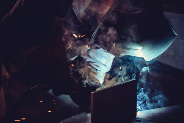 istock Industrial Welder With Torch 665606496