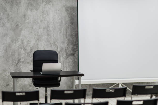 istock Modern university group study room with white desk and chairs 665614828