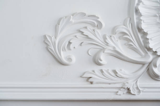 istock Luxury white wall design bas-relief with stucco mouldings roccoco element 665619744