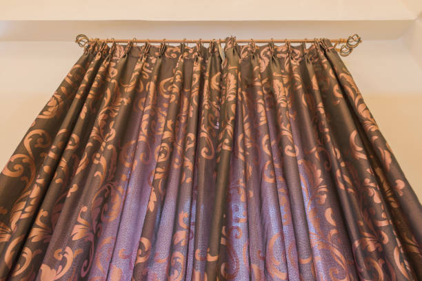 istock Brown colored curtains In stainless steel rail modern style. 665623366
