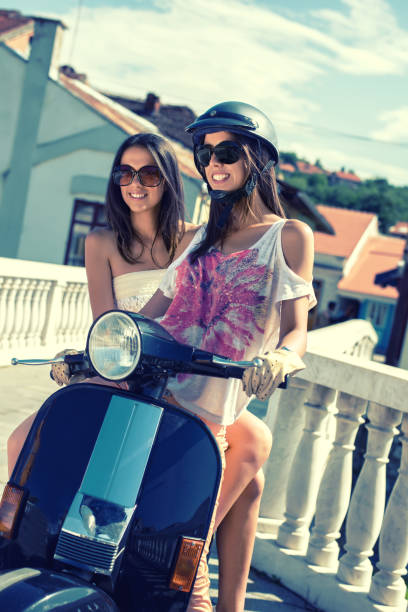 istock Two girlfriends enjoying a summer's day 665626804