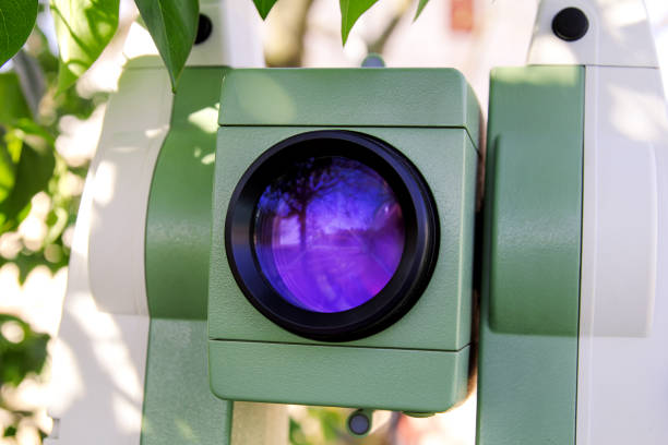 Part of total station instruments objective laser light is emitted from this part. Survey Instrument geodetic device, total station set in the field.