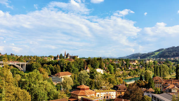 istock Panorama with Kirchenfeld bridge Historical Museum and Aare River Bern 665629766