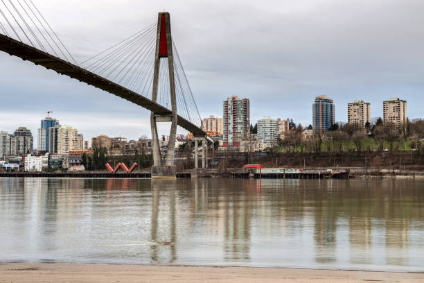 istock skytrain bridge linking Surrey and New Westminster cities in BC, Canada 665631206