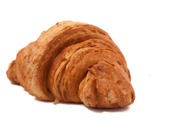 istock Fresh and tasty croissant over isolated white background 665638234