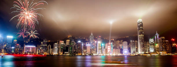 istock Light Show Over Hong Kong Skyline at Victoria Harbor 665641546