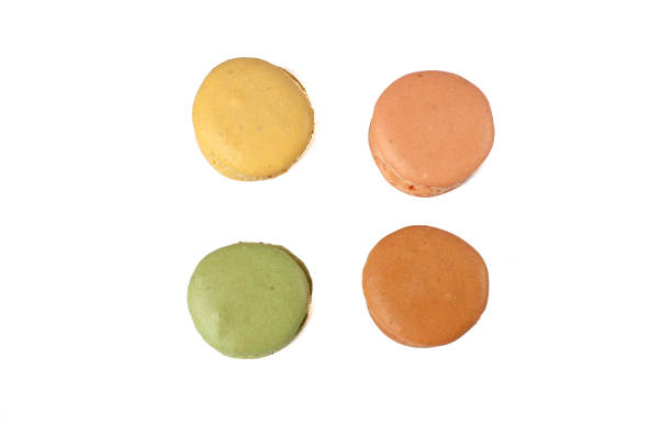 istock Delicious multicolored cake macaron or macaroon on a white background. sweet and colorful dessert. 665644546
