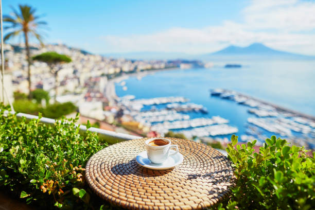 istock Cup of coffee with view on Vesuvius mount in Naples 665644718