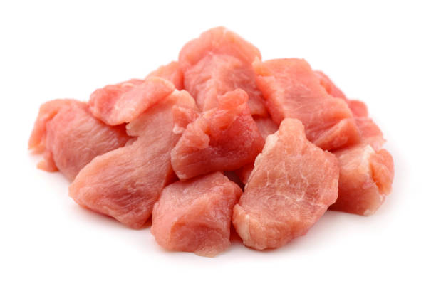 Meat chunks Raw fresh meat chunks isolated on white uncooked bacon stock pictures, royalty-free photos & images