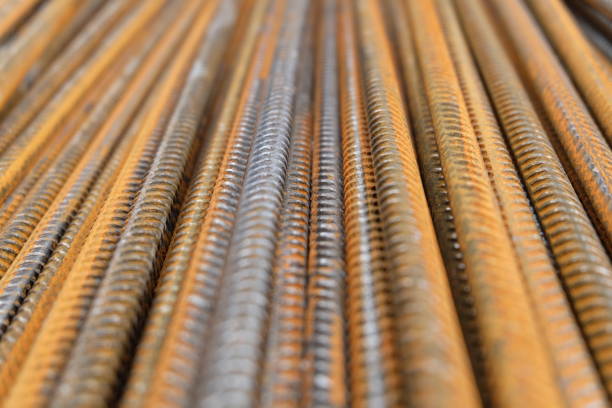 istock A closeup of rusty vertically stacked iron or steel reinforcement bars (division rebar) 665653132