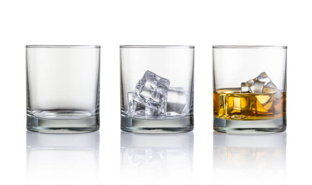 whiskey Empty glass, glass with ice cubes and glass with whiskey and ice cubes. Isolated on white background alcoholics anonymous photos stock pictures, royalty-free photos & images