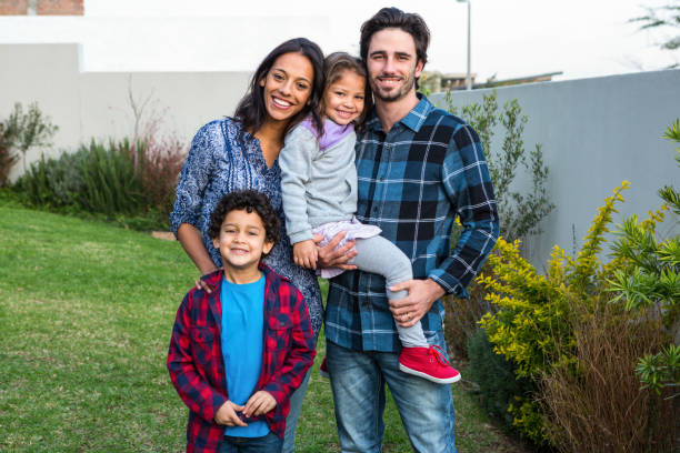 istock Smiling family in the garden 665666236