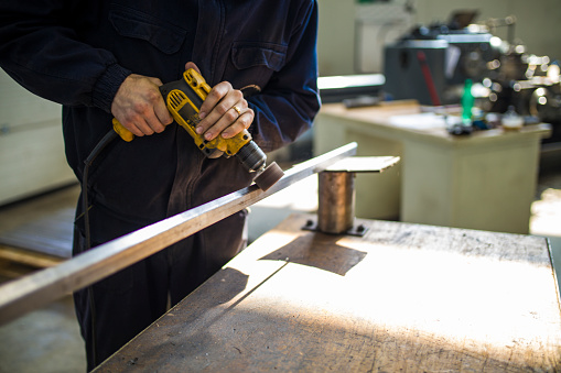 Circular saw in carpentry workshop. No people.