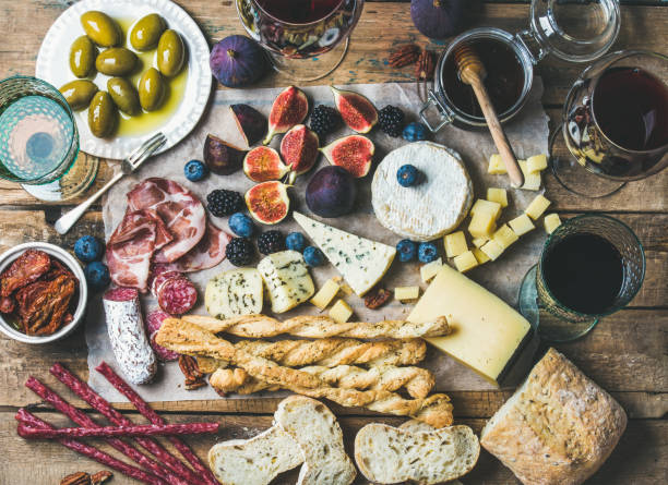 istock Wine, snack set with meat, bread, olives, sun-dried tomatoes, berries 665670798