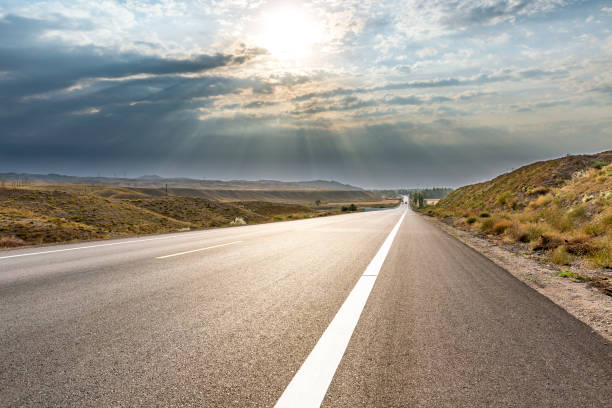 istock An empty straight   highway ,Xinjiang province,China. 665677618