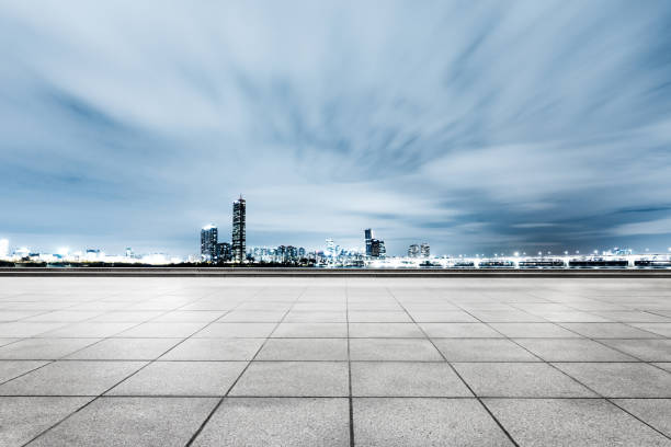 istock empty brick floor with cityscape and skyline 665683526