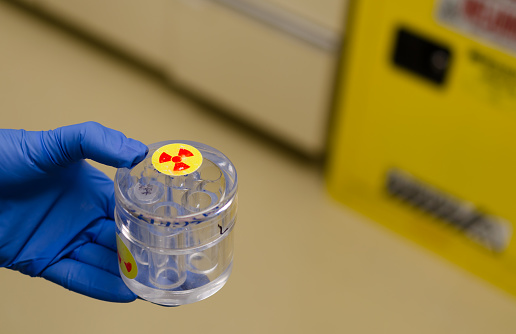 photograph of empty radioactive jar