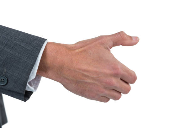 istock Businessman gesturing against background 665699830