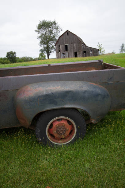 istock Vintage Pickup Truck and Abandoned Barn 665701894