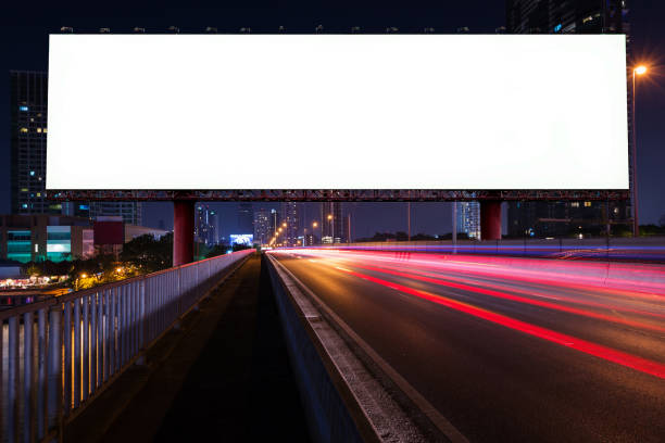istock blank billboard and night street 665708134