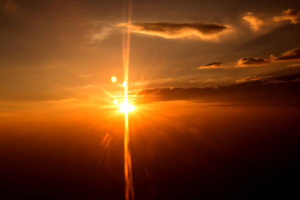 istock View on the sunset and airplane wing from the inside 665711258