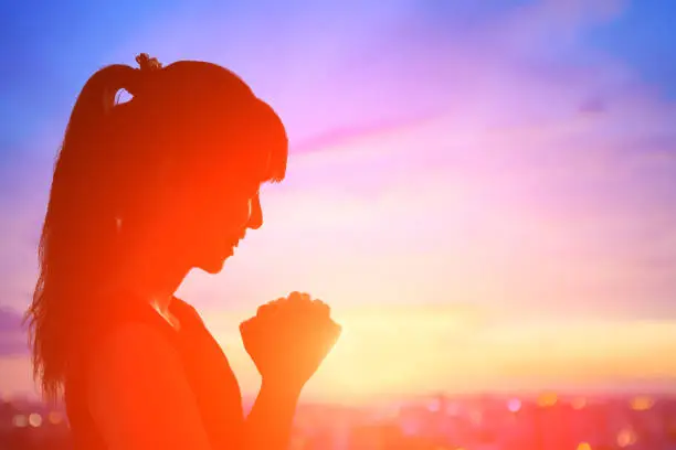 Photo of woman pray pious
