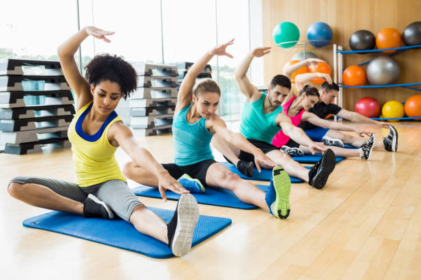 istock Fitness class exercising in the studio 665727738