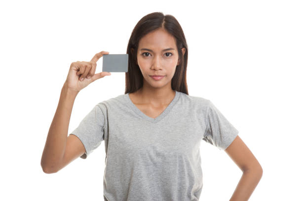 istock Young Asian woman with a blank card. 665730532