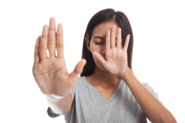 istock Young Asian woman  hide her  face. 665731232