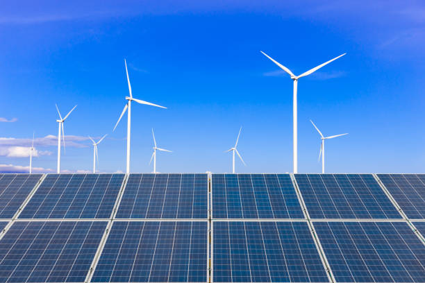 istock solar panels and wind turbines 665734252