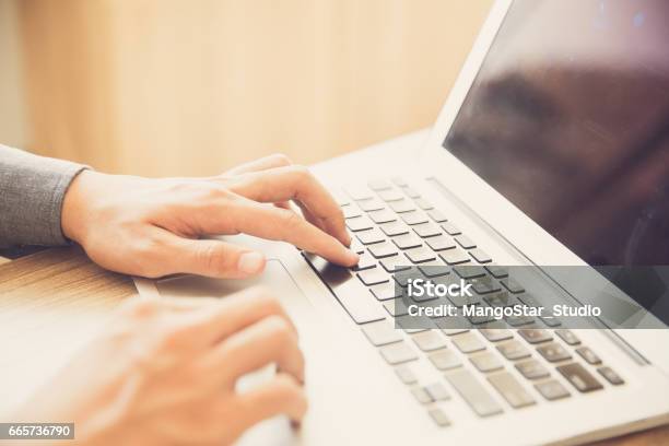 Closeup Of Male Hands Typing On Laptop Indoors Stock Photo - Download Image Now - Adult, Adults Only, Application Form