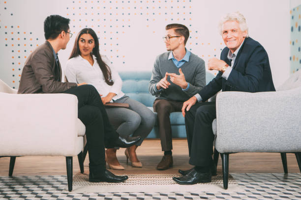 istock Diverse Business Partners Discussing Issue 665736944