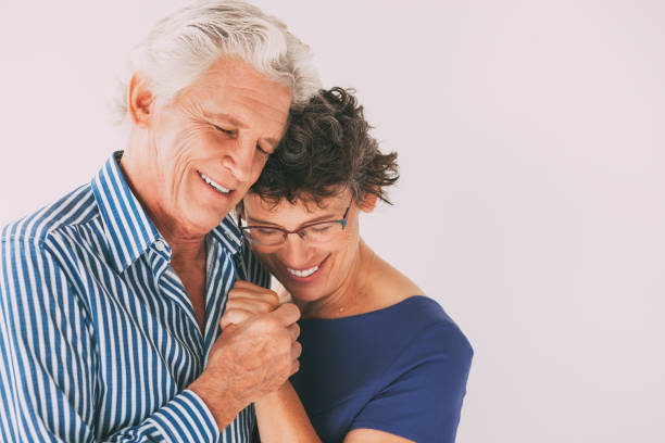 istock Affectionate senior couple embracing and dancing_tone 665737034