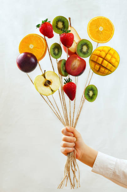 istock Fruit bouquet in a child's hand 665737790