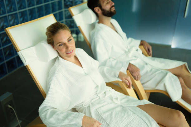 istock Beautiful couple relaxing in spa center 665747134