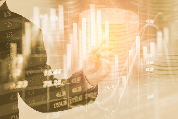 istock Double exposure business man on stock financial exchange. 665747542