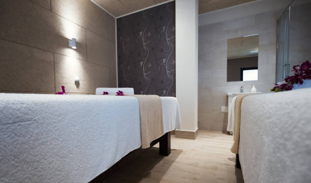 istock Beautiful massage beds in spa resort room 665750310
