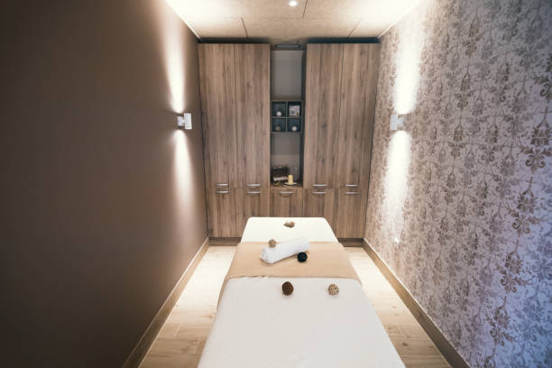 istock Beautiful massage beds in spa resort room 665750472