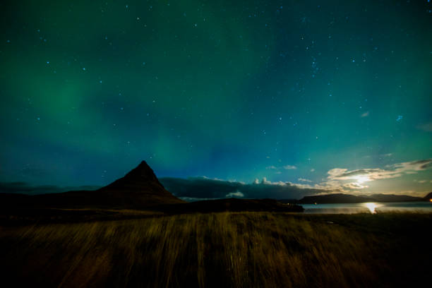istock Aurora Borealis over mountain in Iceland 665761186