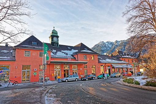 Garmisch-Partenkirchen, Germany - January 6, 2015:  Train station building in Garmisch Partenkirchen old town, Germany. People on the background