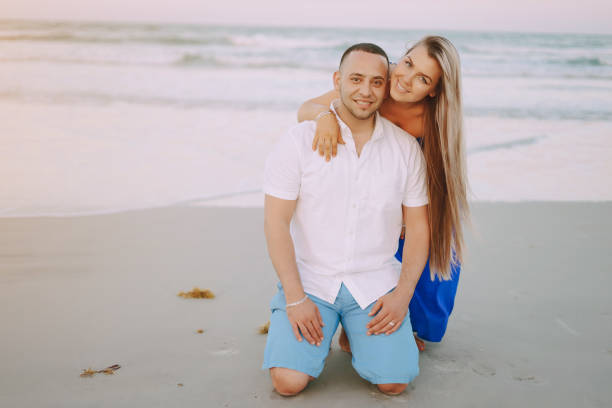 istock beautiful family on the beach 665765302