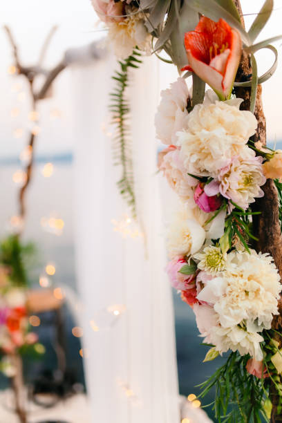 istock Wooden arch for the wedding ceremony at sunset 665768310