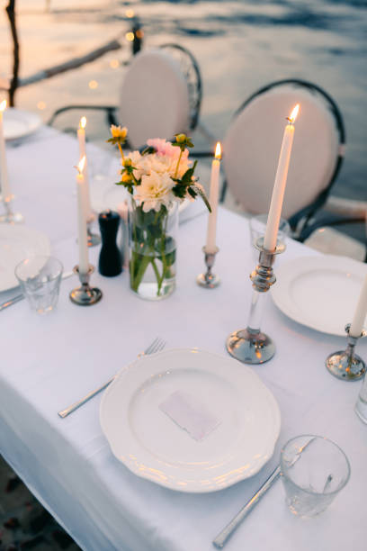 istock Plates at the wedding banquet. Table setting. Wedding decoration 665771248