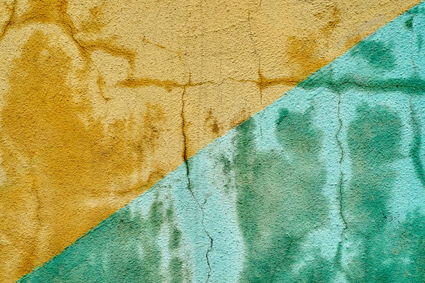 istock Bicolour background of shabby painted damp wall 665772488