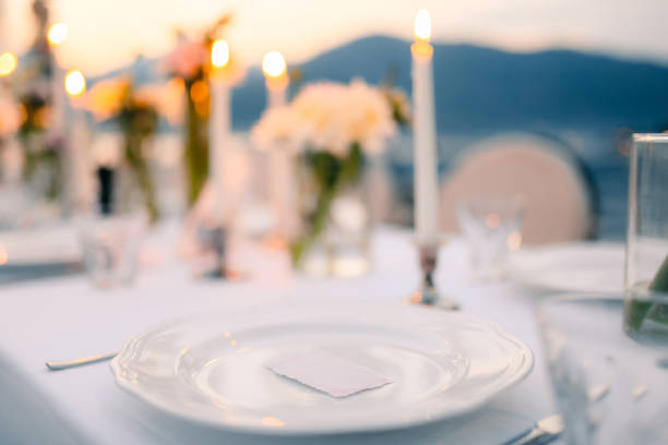 istock Plates at the wedding banquet. Table setting. Wedding decoration 665773170