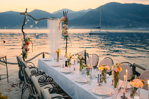 Wedding dinner by the sea. Wedding banquet at the sea. Donja Lastva, Montenegro, Tivat.